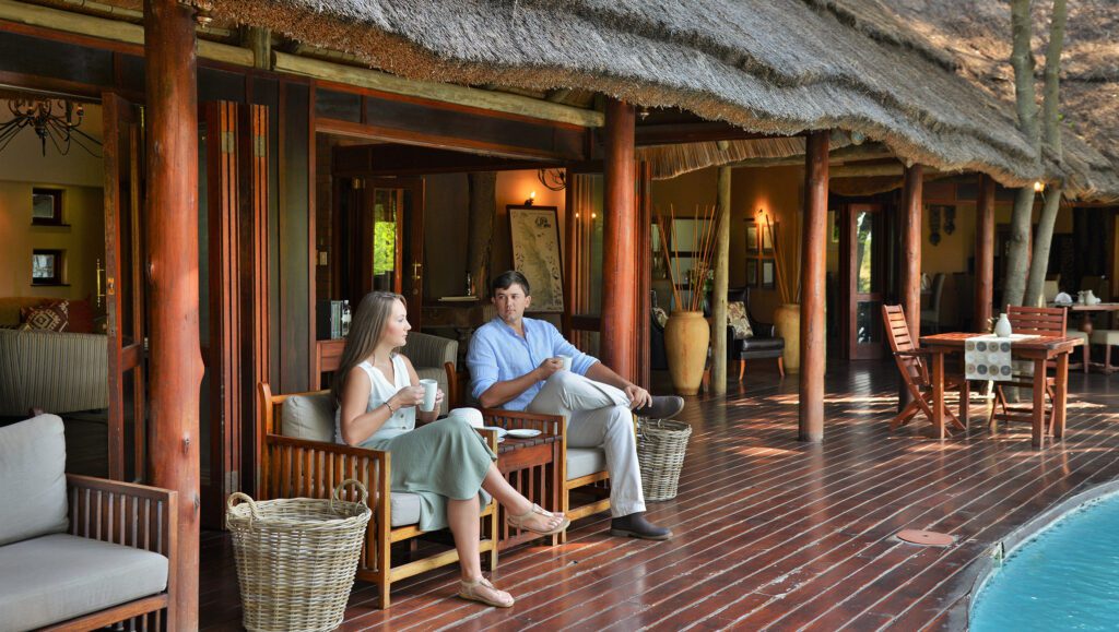 Extraordinary Imbali Safari Lodge Couple on the main deck Extraordinary Imbali Safari Lodge Couple on the main deck