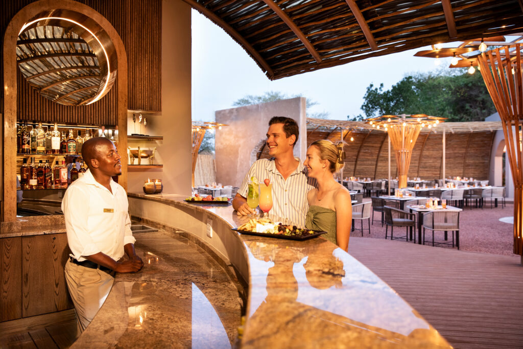 Mabula Game Lodge Boma guests at bar Mabula Game Lodge Boma guests at bar