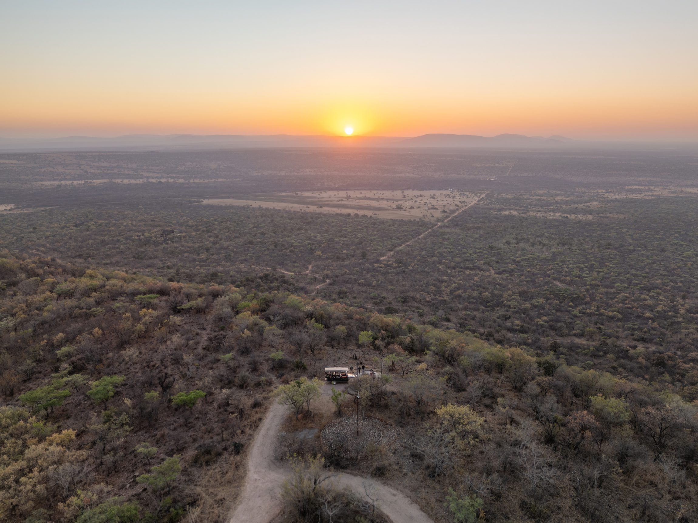 Kwafubesi Tented Camp sundowners on hill